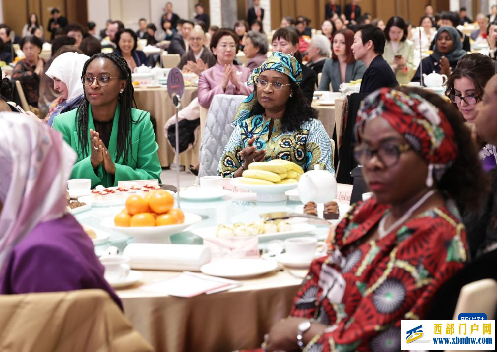 纪念“三八”国际妇女节中外妇女招待会在京举行(图1)